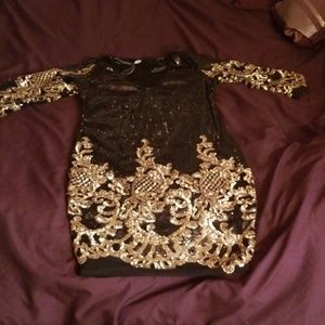 Black and gold sequin dress